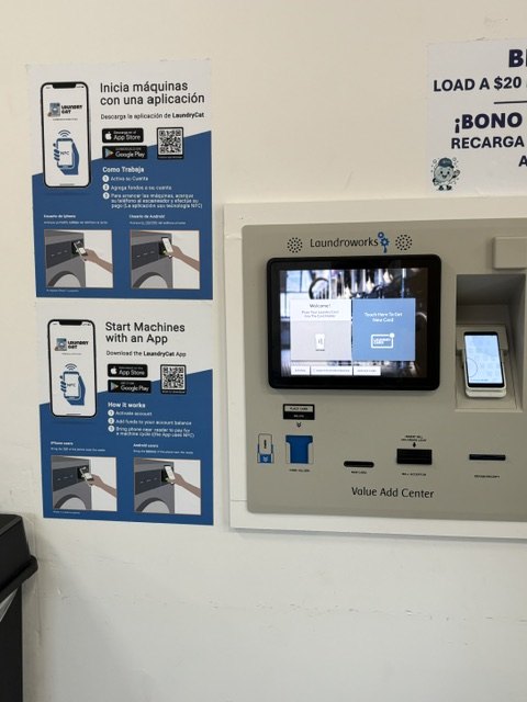 Value Add Center kiosk — pay by card or start machines with the LaundryCat app